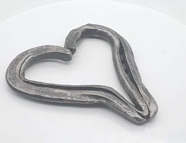 Uit hoefijzer(geluk) gesmeed Hart (liefdes)